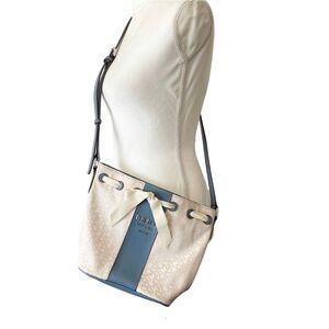 DKNY Ivory Cream and Blue Trims Lace Bow Front Bucket Style Crossbody Purse Bag
